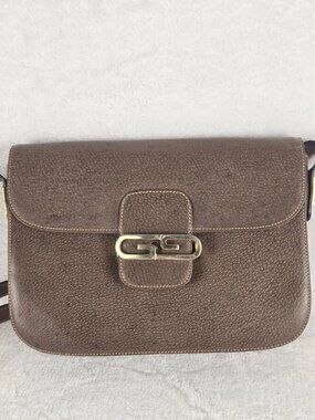 Rare Vintage 1973 Gucci Brown Leather Flap Shoulder Bag with adjustable strap.